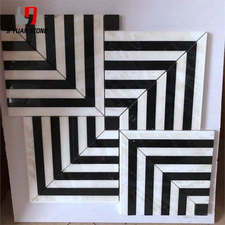 Carrelage mosaïque en pierre noir et blanc