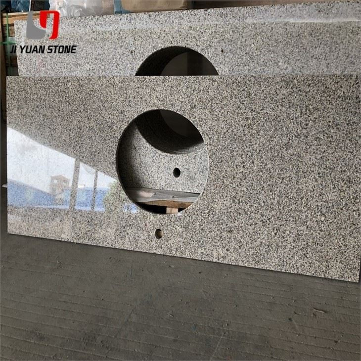 Meuble-lavabo avec comptoir en granit
