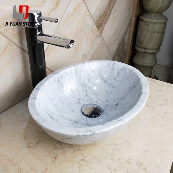 Lavabo redondo de mármol