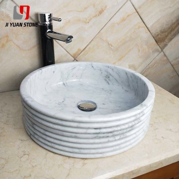 Lavabo redondo de mármol