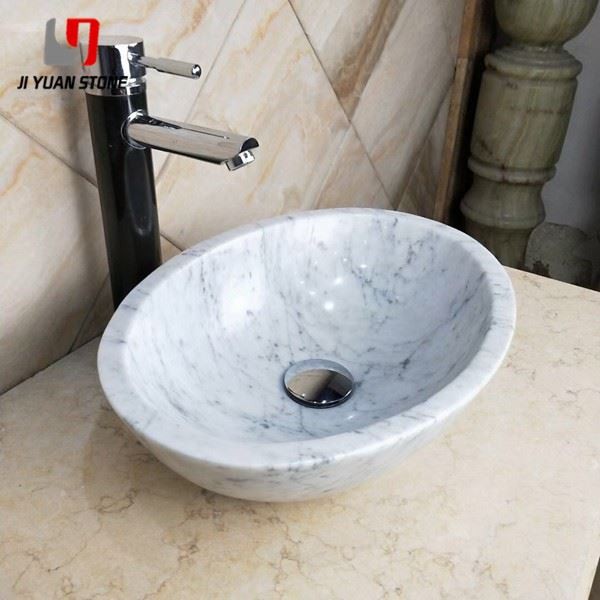 Lavabo redondo de mármol