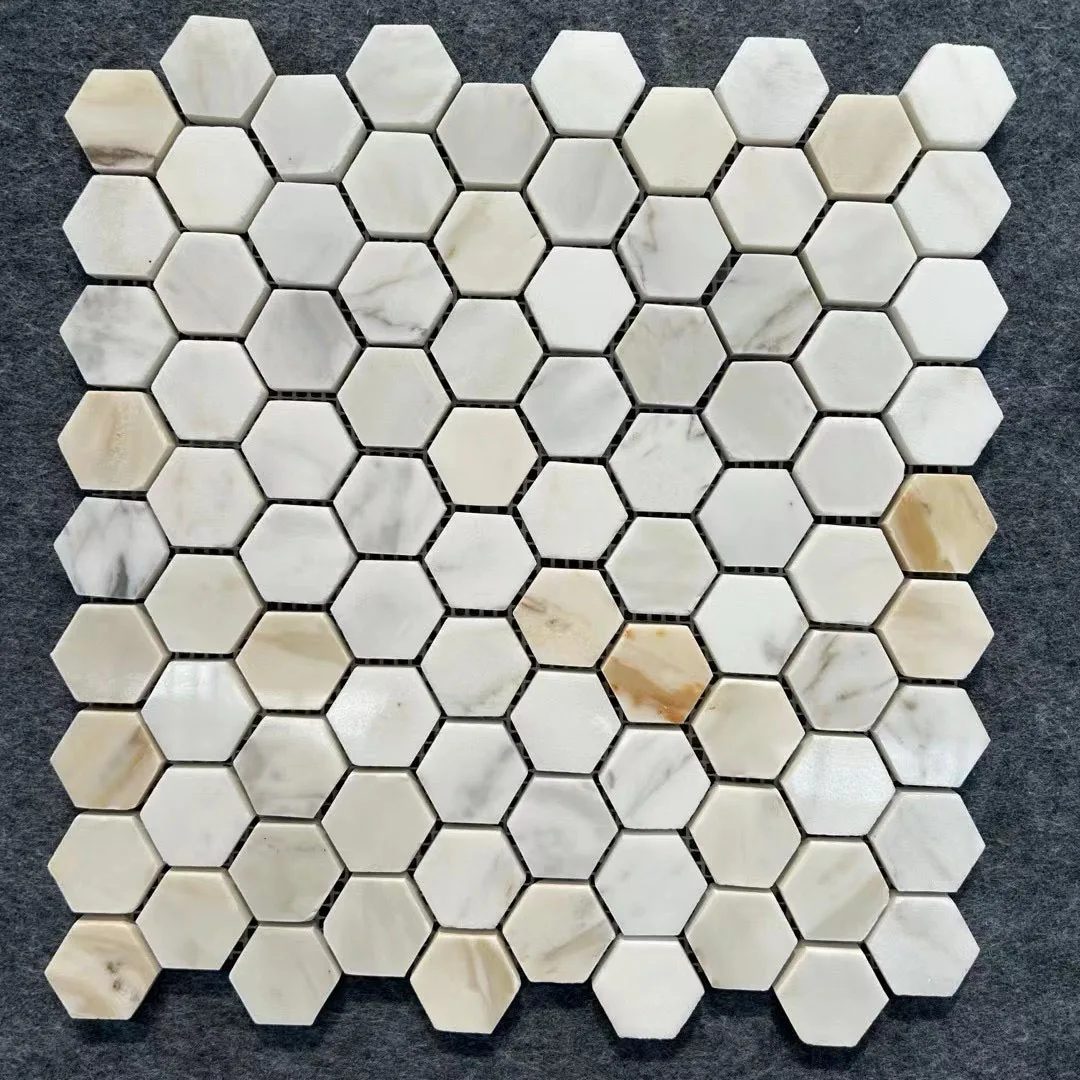 Calacatta Gold marble hexagon mosaic sheet with gold veining
