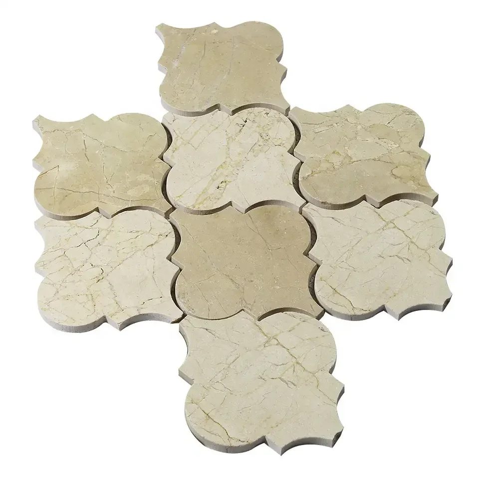 Crema Marfil arabesque mosaic chips laid out to show the lantern shape