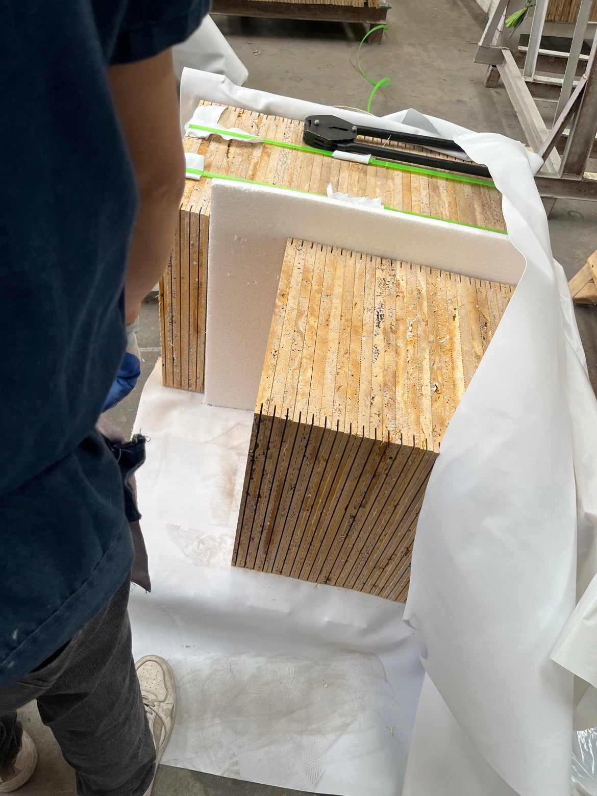 Golden travertine tile crates prepared for export shipment
